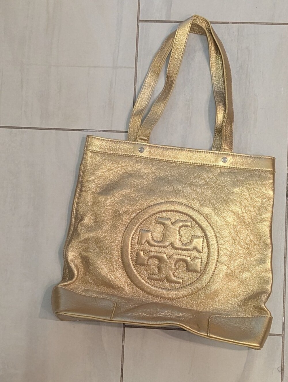 Gold Leather Tory Burch Bag with Embossed Logo